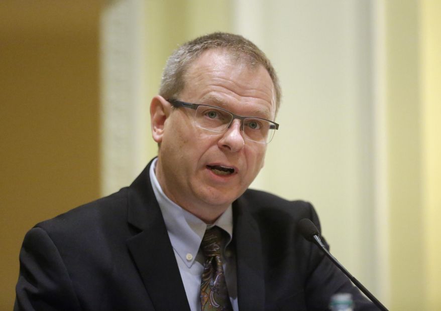 Democrat Doug Owens, candidate for Utah's 4th Congressional District, responds to questions during the annual conference of the Utah Taxpayers Association, Tuesday, May 20, 2014, in Salt Lake City. In their first appearance together, Republican Mia Love and Democrat Owens fielded questions from a Utah taxpayer watchdog group. Owens used his first joint appearance with Republican Mia Love to portray her positions as extreme and hammer the front-runner candidate on her support of U.S. Sen. Mike Lee, a Utah Republican and favorite of tea party conservatives. (AP Photo/Rick Bowmer)