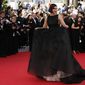 Actress Sonam Kapoor poses for photographers as she arrives for the screening of The Homesman at the 67th international film festival, Cannes, southern France, Sunday, May 18, 2014. (AP Photo/Alastair Grant)