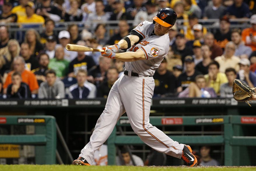 Baltimore Orioles&#39; Chris Davis hits a two-run home run off Pittsburgh Pirates starting pitcher Francisco Liriano during the fifth inning of a baseball game in Pittsburgh on Tuesday, May 20, 2014. (AP Photo/Gene J. Puskar)