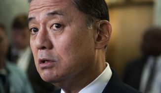 In this May 15, 2014, photo, Veterans Affairs Secretary Eric Shinseki speaks with the news media on Capitol Hill in Washington. Shinseki would be granted more authority to fire or demote senior executives under a bill headed to the House floor. The measure comes as pressure builds on Capitol Hill to overhaul the beleaguered agency in response to allegations of treatment delays and preventable deaths.  (AP Photo/Cliff Owen)