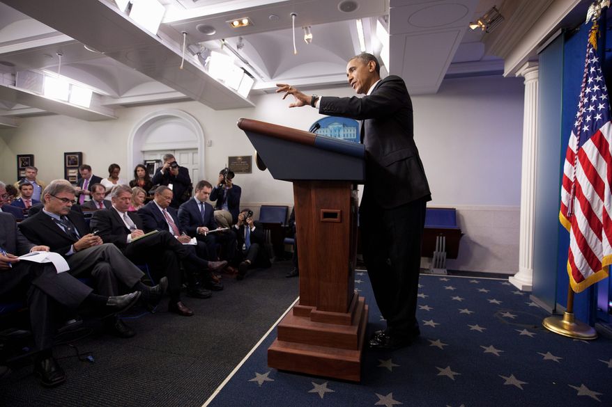 "We have to find out how can we realistically cut some of these wait times," President Obama said. "There has been a large influx of new veterans coming in. We've got a population of veterans that is also aging, as part of the baby boom population. And we've got to make sure that the scheduling system, the access to the system, that all those things are in sync." (Associated Press)