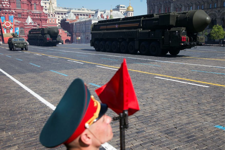 A Russian intercontinental ballistic missile rolls across Red Square during the Victory Day Parade. The launch of the missile was to test a prospective warhead, Interfax news agency quoted the Defense Ministry spokesman Igor Yegorov as saying. (Associated Press)