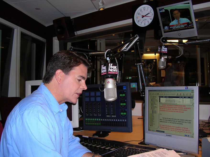 ** FILE ** This May 31, 2005, file photo shows Fox News shows anchor Gregg Jarrett rehearsing in New York for the debut of Fox News Radio's five-minute newscast. Jarrett was jailed Wednesday May 21, 2014, after being arrested in a bar at Minneapolis-St. Paul Airport. (AP Photo/Fox News, File)
