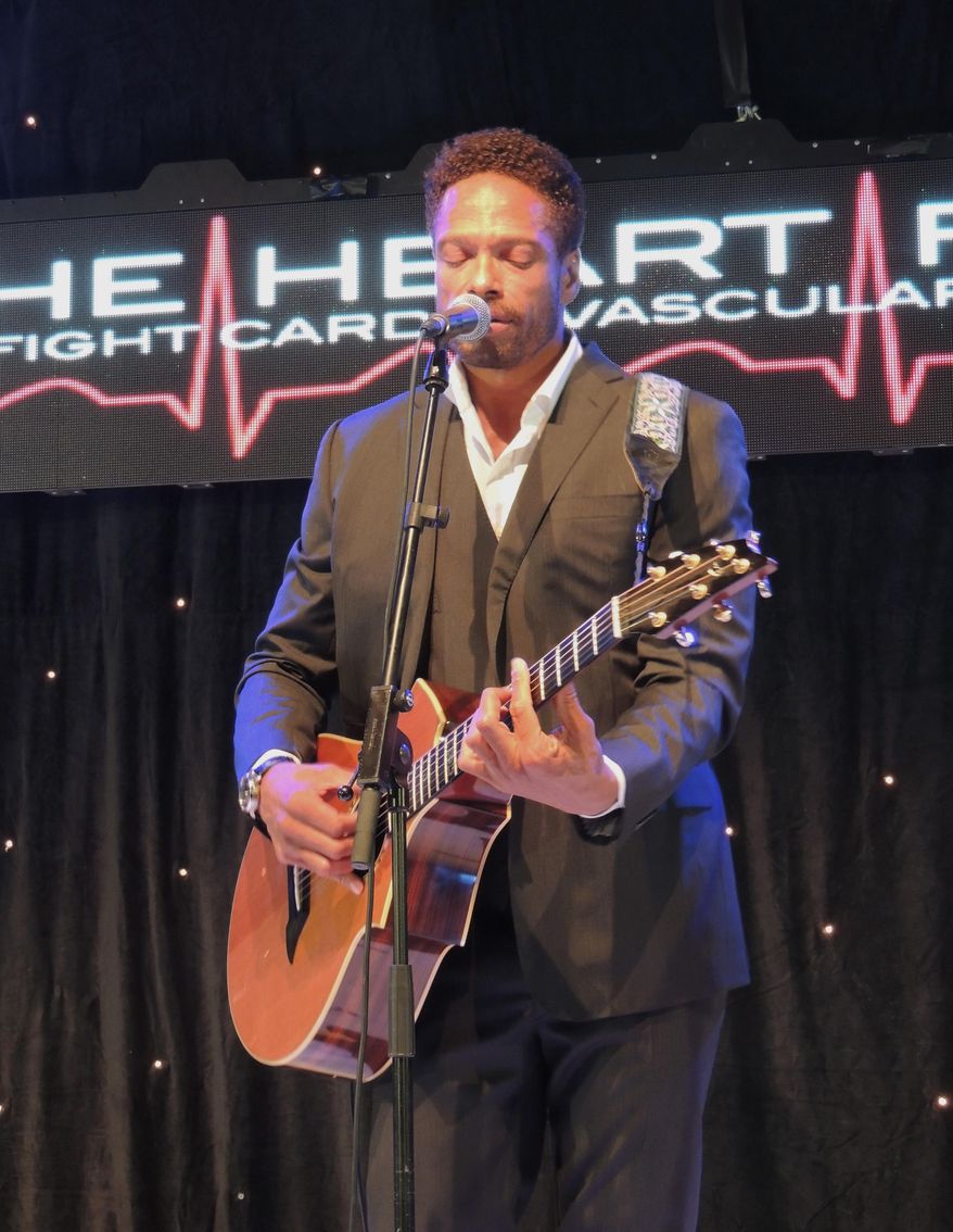In this photo taken on Wednesday, May 21, 2014, actor Gary Dourdan performs at the Heart Fund Charity Ball in Cannes, Southern France. The gala for the Heart Fund foundation was designed to raise awareness and funds for the group which provides heart care to needy children worldwide. (AP Photo/Nekesa Moody)