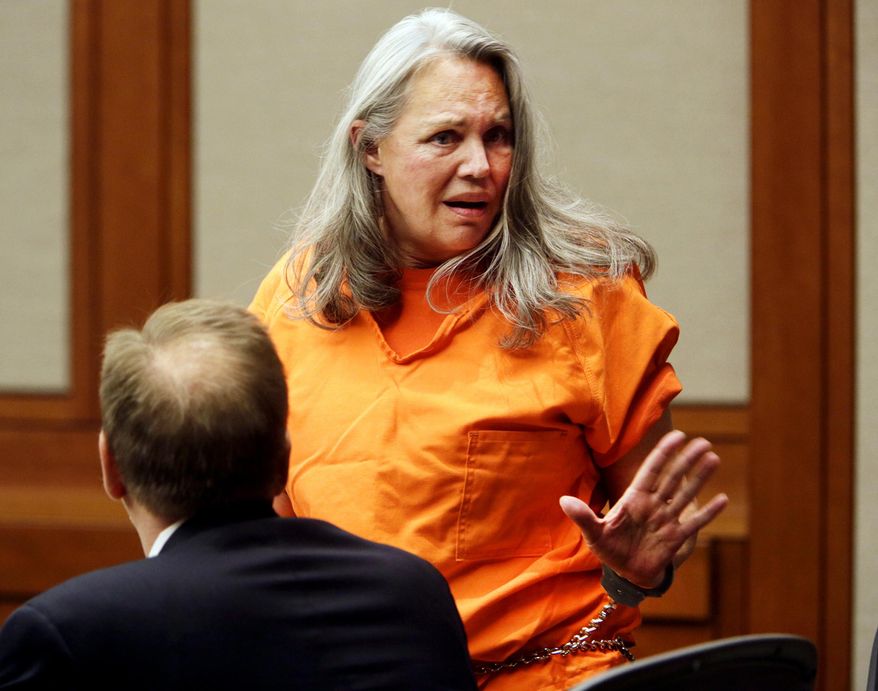 Pamela Phillips pleads her innocence in Pima County Superior Court in Tucson, Ariz., Thursday, May 22, 2014 prior to her being sentenced to natural life in prison without the possibility of parole in the 1996 Tucson car bomb killing of her ex-husband. Phillips also was sentenced Thursday to 25 years to life for conspiracy to commit first-degree murder. (AP Photo/Arizona Daily Star, Ron Medvescek)