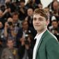 Director Xavier Dolan poses during a photo call for Mommy at the 67th international film festival, Cannes, southern France, Thursday, May 22, 2014. (AP Photo/Alastair Grant)