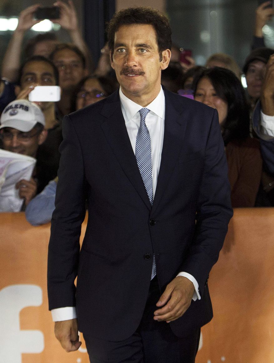 In this Sept. 7, 2013 file photo, actor Clive Owen arrives for the screening of the movie "Words and Pictures" during the 2013 Toronto International Film Festival in Toronto. The movie opens in theaters in the U.S. on Friday, May 23, 2014. (AP Photo/The Canadian Press, Nathan Denette, file)