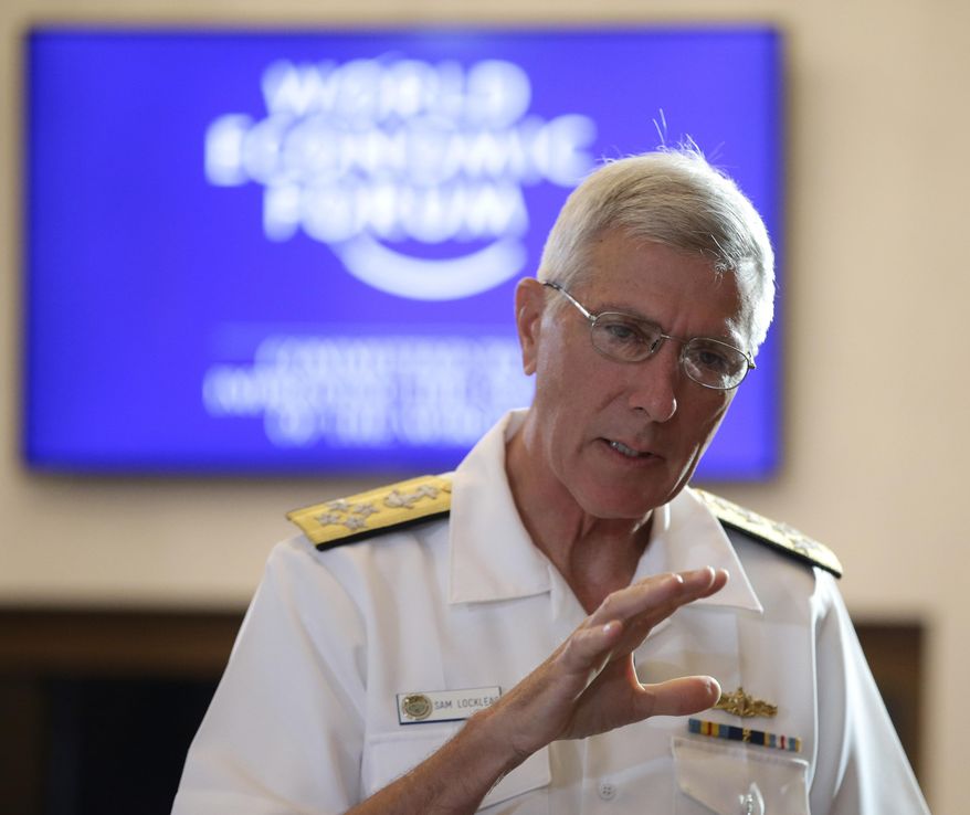 U.S. Pacific Command Commander Adm. Samuel J. Locklear III, gestures prior to the session on "Security Outlook" in the ongoing World Economic Forum on East Asia Friday, May 23, 2014 at the financial district of Makati city, east of Manila, Philippines. Locklear warns that the "risk of miscalculation" that could trigger a wider conflict in a tense territorial standoff between China and Vietnam is high and urged both nations to exercise restraint. Locklear also said Friday that the Asian neighbors should resolve their territorial conflicts on the basis of international law.(AP Photo/Bullit Marquez)