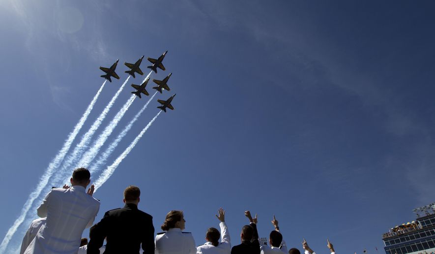 U.S. Navy flight demonstration team The Blue Angels perform a flyover above graduating Midshipmen during the United States Naval Academy 2014 Class graduation and commissioning ceremonies at Navy-Marine Corps Stadium in Annapolis, Md., Friday, May 23, 2014. (AP Photo/Jose Luis Magana) **FILE**