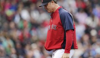 Boston Red Sox manager John Farrell heads back to the dugout after removing starter Jon Lester during the seventh inning against the Toronto Blue Jays in a baseball game at Fenway Park, Thursday, May 22, 2014, in Boston.  Lester gave up seven runs on 10 hits in the Red Sox&#39;s 7-2 loss, the team&#39;s seventh straight loss at home. (AP Photo/Charles Krupa)