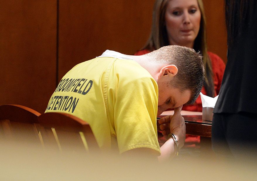 Matthew Burnett sits in Broomfield County Court on Friday, May 23, 2014 for sentencing after pleading guilty to second degree murder in the death of 34-year-old James Clifford Fernandez. Police say Fernandez' body was found on a street Aug. 17 after he got in an argument with Burnett . (AP Photo/The Daily Camera, Cliff Grassmick) NO SALES