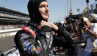 Kurt Busch prepares to drive on the final day of practice for the Indianapolis 500 IndyCar auto race at the Indianapolis Motor Speedway in Indianapolis, Friday, May 23, 2014. The 98th running of the Indianapolis 500 is Sunday. (AP Photo/Tom Strattman)