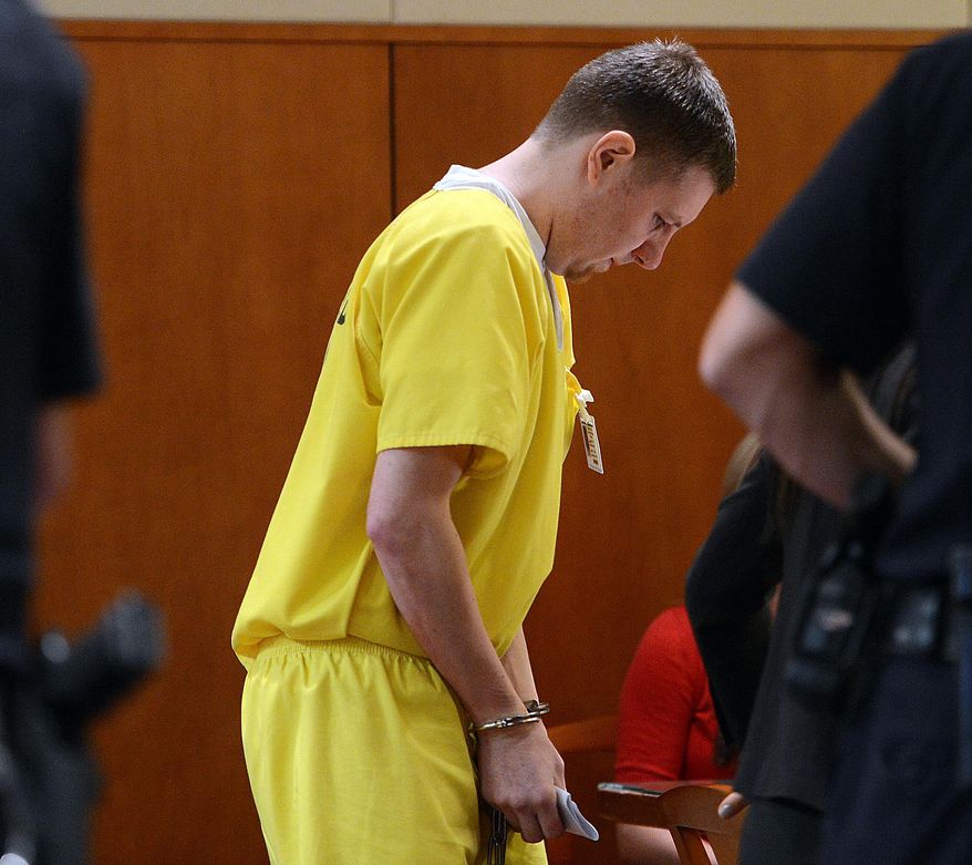 Matthew Burnett stands in Broomfield County Court for sentencing on Friday, May 23, 2014 in Broomfoeld, Co., after pleading guilty to second degree murder in the death of 34-year-old James Clifford Fernandez. Police say Fernandez' body was found on a street Aug. 17 after he got in an argument with Burnett. (AP Photo/The Daily Camera, Cliff Grassmick) NO SALES