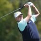 Colin Montgomerie tees off on the fourth hole during the third round of the 75th Senior PGA Championship golf tournament at Harbor Shores Golf Club in Benton Harbor, Mich., Saturday, May 24, 2014. (AP Photo/Paul Sancya)