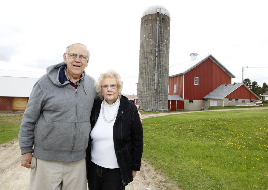 Jim Grupp and his sister Kathryn Grupp, seen in a Tuesday, May 13, 2014 photo, own their family farm near Denver, Iowa, which has been designated a Heritage farm. (AP Photo/Waterloo Courier, Brandon Pollock)