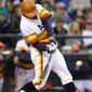 Houston Astros&#39; George Springer hits a two-run home run against the Seattle Mariners in the fifth inning of a baseball game Saturday, May 24, 2014, in Seattle. (AP Photo/Elaine Thompson)
