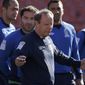 Azerbaijan soccer head coach Berti Vogts, center, gathers his team together before practice at Candlestick Park in San Francisco, Sunday, May 25, 2014. (AP Photo/Jeff Chiu)