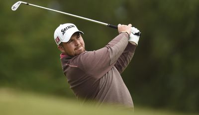 Ireland&#39;s Shane Lowry  plays a shot during day three of the BMW PGA Championships at the Wentworth Club, Virginia Water England Saturday May 24, 2014.(AP Photo/Adam Davy/PA) UNITED KINGDOM OUT