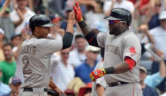 Boston Red Sox David Ortiz, right, celebrates his three run homer with teammate Xander Bogaerts in the fifth inning of a baseball game against the Atlanta Braves in Atlanta, Monday May 26, 2014. (AP Photo/Atlanta Journal-Constitution, Brant Sanderlin )  MARIETTA DAILY OUT; GWINNETT DAILY POST OUT; LOCAL TV OUT; WXIA-TV OUT; WGCL-TV OUT   .