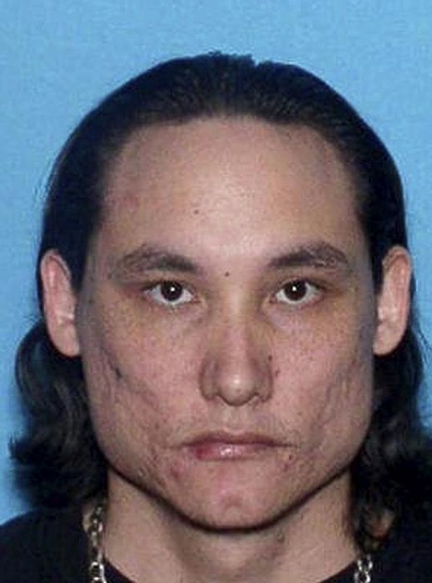 In this undated image released by the Knox County Sheriff's Department on Tuesday, May 27, 2014, shows David E. Smith in Knoxville, Tenn. Authorities say Smith, a suspect in a Florida triple homicide, has been captured after he called 911 saying he wanted to die at the hands of law enforcement. (AP Photo/Knox County Sheriff's Department)
