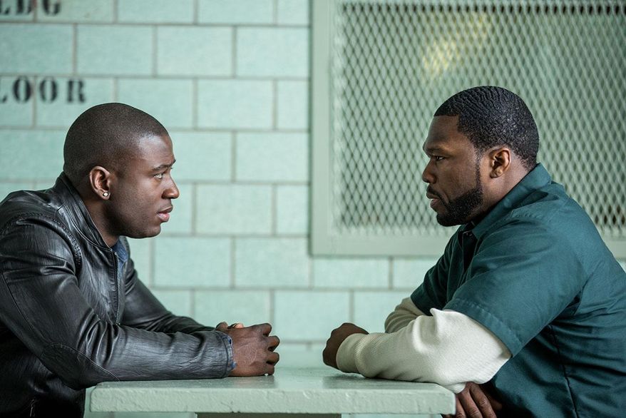 This undated image released by Starz shows Sinqua Walls, left, and Curtis Jackson, better known as 50 Cent, in a scene from "Power," premiering on June 7. “Power,” a gritty new drama executive produced by 50 Cent, chronicles both the underpinnings of a brutal drug trade life and the glamour of the clubs. (AP Photo/Starz)