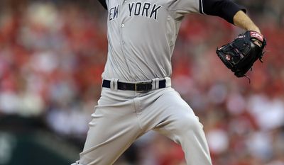 New York Yankees starting pitcher David Phelps throws during the first inning of a baseball game against the St. Louis Cardinals on Tuesday, May 27, 2014, in St. Louis. (AP Photo/Jeff Roberson)