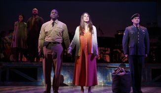 This 2014 photo provided by Roundabout Theatre Company shows, front, from left, Joshua Henry, Sutton Foster, and Colin Donnell, rear, from left, Emerson Steele, and Alexander Gemignani, in a scene from the Tony Award-nominated musical &amp;quot;Violet,&amp;quot; at the American Airlines Theatre in New York. (AP Photo/Roundabout Theatre Company, Joan Marcus)