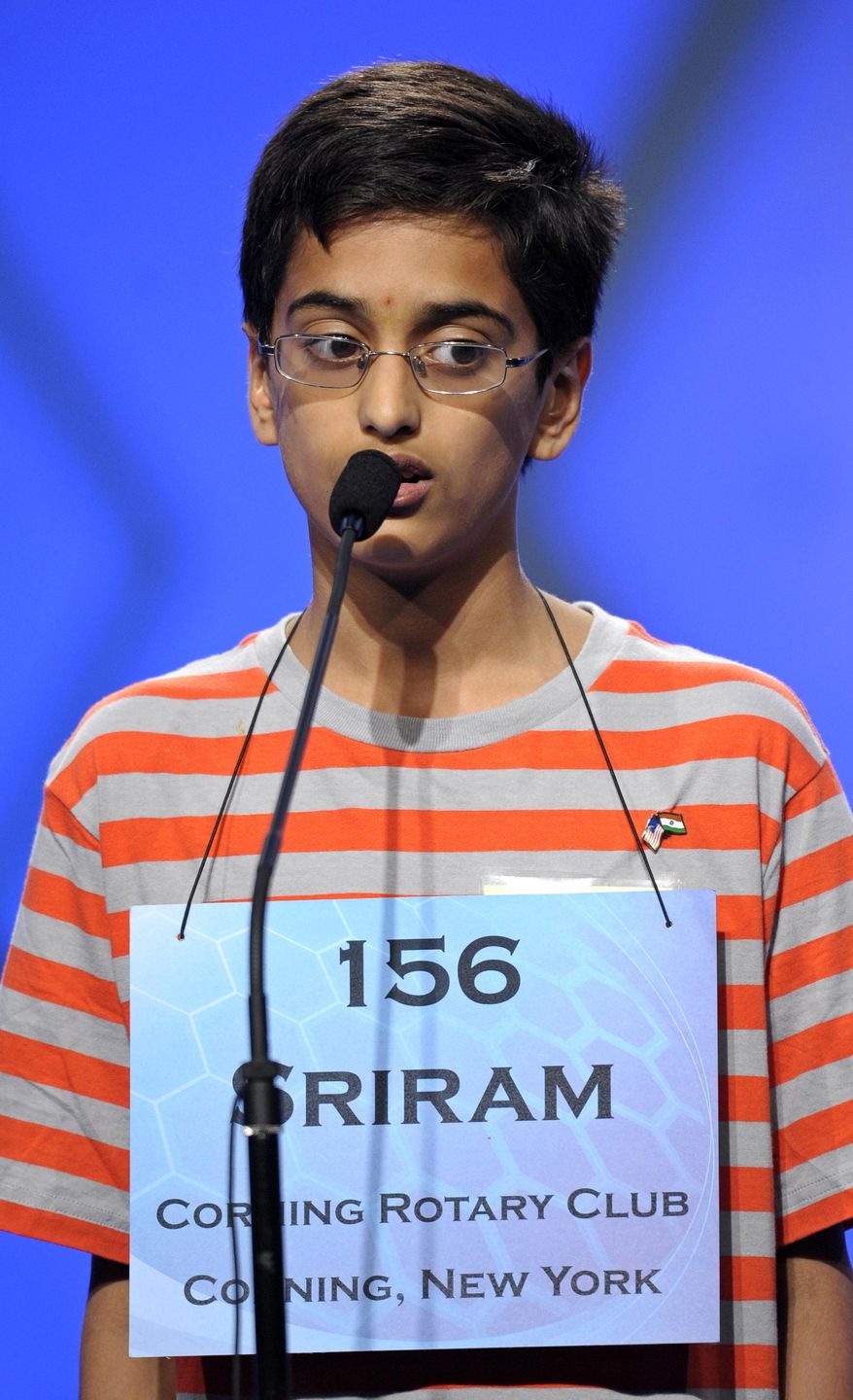 FILE - In this May 30, 2013 file photo, Sriram Hathwar, 13 of Painted Post, N.Y., spells "flaneur" during the semifinal round of the Scripps National Spelling Bee in Oxon Hill, Md. (AP Photo/Cliff Owen)