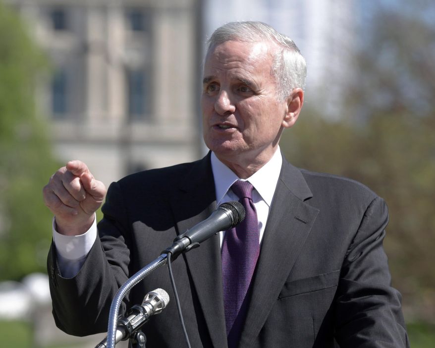 FILE - In this May 22, 2014 file photo Minnesota Gov. Mark Dayton speaks at the Minnesota State Capitol in St. Paul. Minn. Dayton said on Tuesday, May 27, 2014 Minnesotans will find life simpler after a so-called "Unsession" that wiped more than 1,000 outdated laws off the books. (AP Photo/Jim Mone, File)