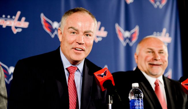Washington Capitals owner Ted Leonsis and president Dick Patrick introduce new general manager Brian MacLellan, left, and head coach Barry Trotz, right, to the media at a press conference at the Verizon Center, Washington, D.C., Tuesday, May 27, 2014. (Andrew Harnik/The Washington Times)