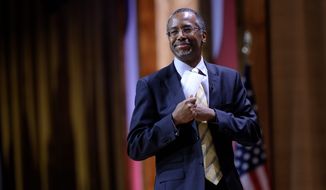 Dr. Ben S. Carson, professor emeritus at Johns Hopkins School of Medicine, seen here at the Conservative Political Action Conference in March, told a gathering Wednesday at the National Press Club that when he retired, he expected to play golf and learn new languages, but &quot;God has different plans for me.&quot; (Associated Press)