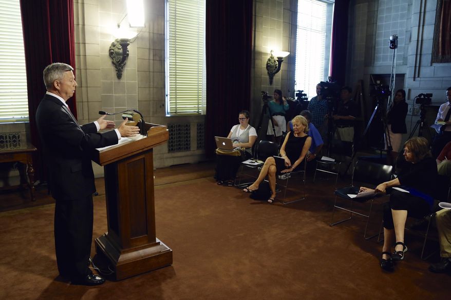 Nebraska Gov. Dave Heineman speaks at a news conference in Omaha, Neb., Wednesday, May 28, 2014. Gov. Heineman announced he had applied for the University of Nebraska presidency, little more than a week after he publicly expressed interest in the job. The presidency came open with the departure of J.B. Milliken, who became chancellor of the City University of New York. (AP Photo/Nati Harnik)