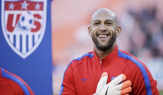 United States goalkeeper Tim Howard smiles during player introductions before an international friendly soccer match against Azerbaijan on Tuesday, May 27, 2014, in San Francisco. (AP Photo/Marcio Jose Sanchez)