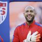 United States goalkeeper Tim Howard smiles during player introductions before an international friendly soccer match against Azerbaijan on Tuesday, May 27, 2014, in San Francisco. (AP Photo/Marcio Jose Sanchez)