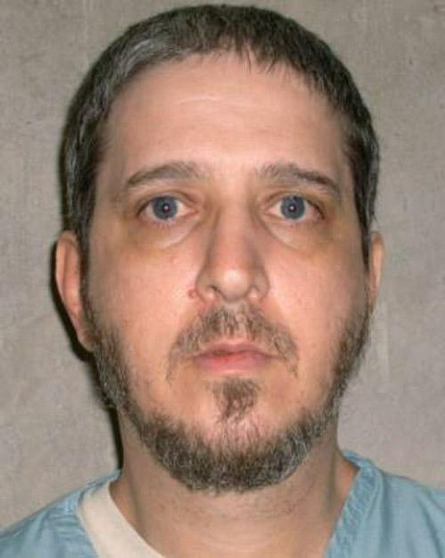 This photo provided by the Oklahoma Department of Corrections shows Richard Glossip. An Oklahoma court has scheduled a Nov. 20, 2014 execution date for the convicted killer while the state’s protocol is under review following a botched execution. The Oklahoma Court of Criminal Appeals on Glossip has exhausted his appeals. (AP Photo/Oklahoma Department of Corrections)