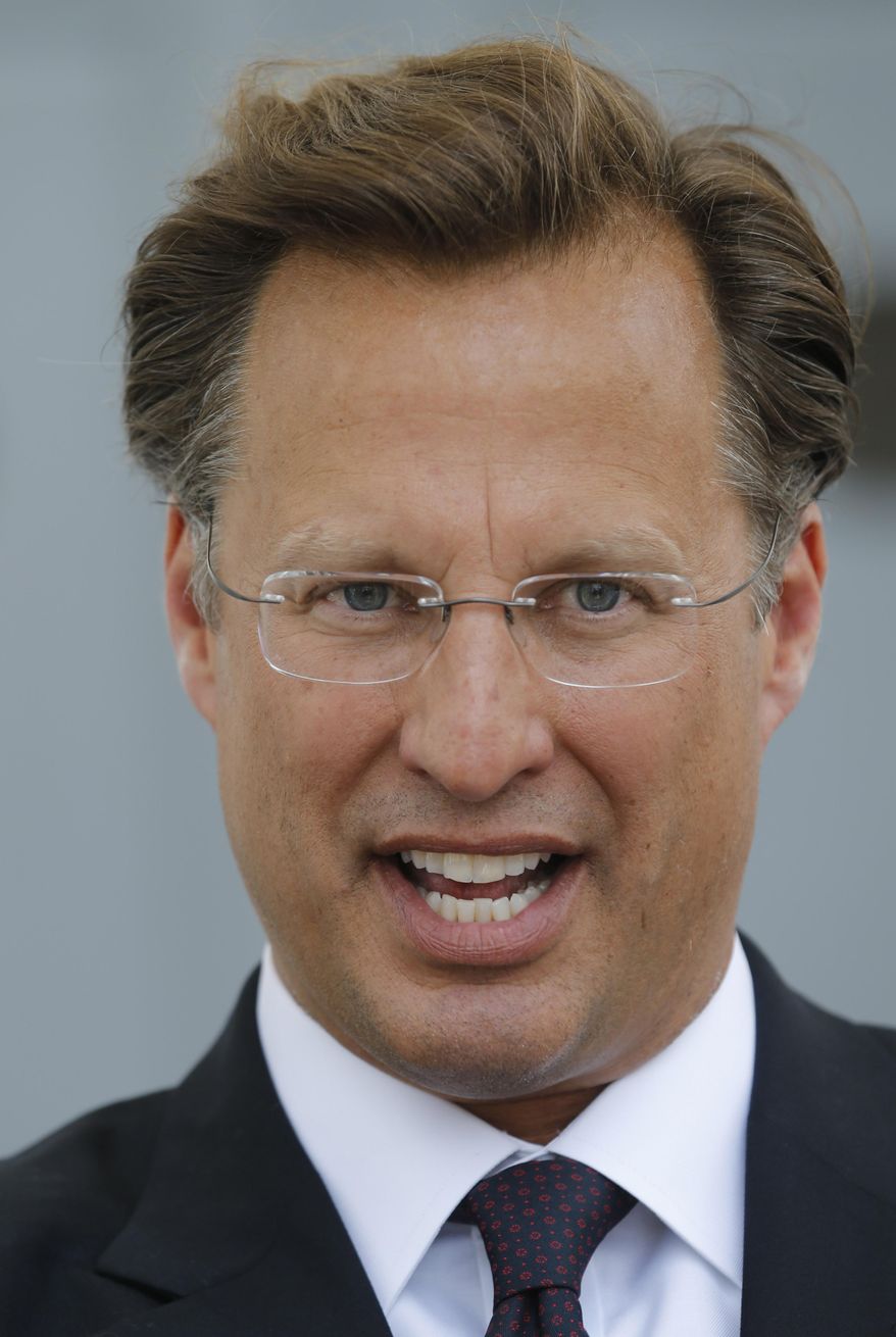 Seventh District US Congressional Republican candidate, David Brat, speaks during a press conference at the Captiol in Richmond, Va., Wednesday, May 28, 2014.  Brat challenged Congressman Eric Cantor's stand on immigration, claiming that Cantor backs amnesty. Cantor is getting pressured from both sides over immigration as his Republican primary election nears and the window for legislative action narrows.   (AP Photo/Steve Helber)