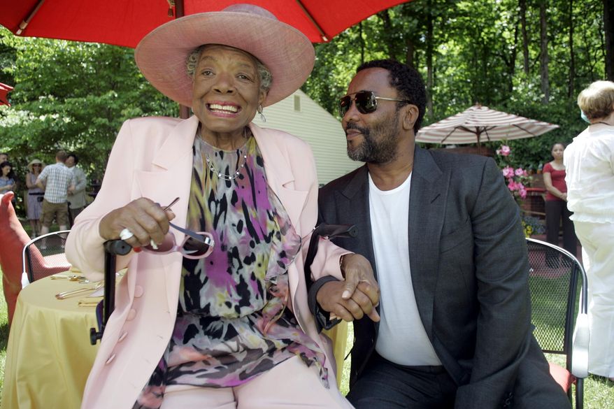 FILE - In this May 20, 2010 file photo, Poet Maya Angelou, left, greets director Lee Daniels at a garden party in honor of Angelou at Angelou's home in Winston-Salem, N.C. Angelou, a Renaissance woman and cultural pioneer, has died, Wake Forest University said in a statement Wednesday, May 28, 2014. She was 86. (AP Photo/Nell Redmond, File)