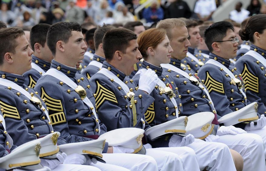 A cadet yawns as he, and others, attend the U.S. Military Academy at West Point's Class of 2014, graduation ceremony in West Point, N.Y., Wednesday, May 28, 2014. In a broad defense of his foreign policy, the president declared that the U.S. remains the world's most indispensable nation, even after a "long season of war," but argued for restraint before embarking on more military adventures. (AP Photo/Susan Walsh)