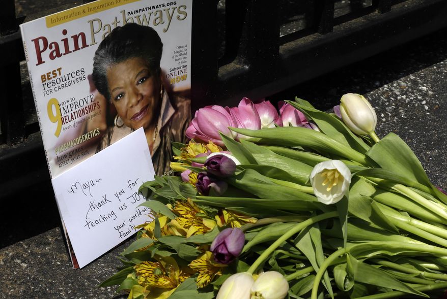 A bouquet of flowers and a magazine showing Maya Angelou on the cover lies outside a gate at the home of Angelou in Winston-Salem, N.C., Wednesday, May 28, 2014. Angelou, a Renaissance woman and cultural pioneer, has died, Wake Forest University said in a statement Wednesday. She was 86. (AP Photo/Gerry Broome)