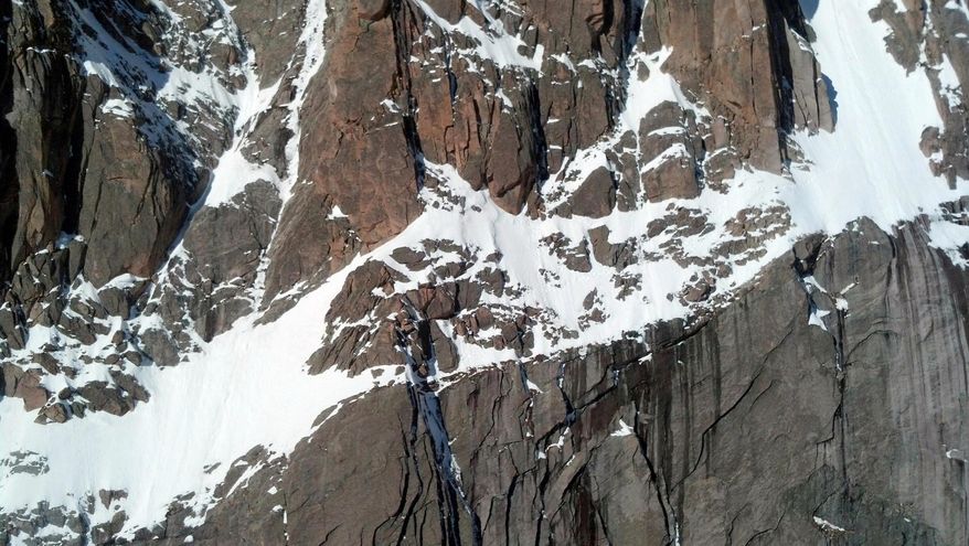 This photo provided by Rocky Mountain National Park shows the area where a Canadian teen was rescued from a 13,000-foot ledge in Rocky Mountain National Park, Colo. Park officials say Samuel Frappier, 19, of Quebec was able to walk and talk when he was flown to a landing zone in the park and taken by ambulance to a hospital Wednesday, May 28, 2014 for an evaluation. Frappier was stranded Tuesday on the east side of Longs Peak while descending from the top of the 4,350-metre precipice. Rescuers reached Frappier about 6 p.m. Mountain Time on Wednesday. He was spotted about 300 metres below the summit on Broadway Ledge. (AP Photo/Rocky Mountain National Park)