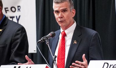 Matt Rosendale answers questions during a debate among candidates for the GOP nomination for U.S. House on Wednesday evening, May 28, 2014, at the Red Lion Hotel in Kalispell, Mont. (AP Photo/The Daily Inter Lake, Patrick Cote)