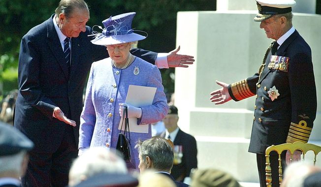 FILE - In this June 6, 2004 file photo, French President Jacques Chirac, left, greets Queen Elizabeth II, of Britain, and her husband Prince Philip at the British military cemetery in Bayeux, northwestern France, during ceremonies marking the 60th anniversary of the D-Day landings in Normandy. The perils of World War II directly shaped the lives of Elizabeth, 88, and Philip, 92. The anniversary is so heartfelt that the royal couple is preparing to cross the English Channel once more, this time on a Eurostar train through the Channel Tunnel Elizabeth helped 20 years ago. (AP Photo/Michel Spingler, File)