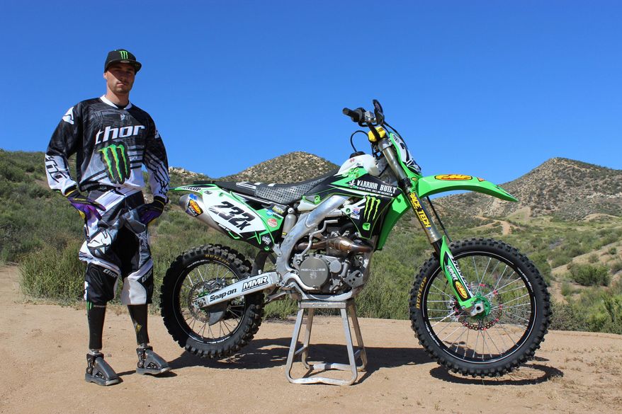 ADVANCE FOR WEEKEND EDITIONS, JUNE 1-2 - In this undated photo provided by Monster Energy, double-amputee Jesse Williamson poses in Temecula, Calif. War took Williamson's legs. Climbing back onto a dirt bike _with the helping hand of a friend _ and racing across the desert brought purpose back to his life. (AP Photo/Monster Energy)