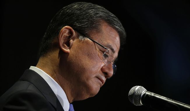 Veterans Affairs Secretary Eric Shinseki pauses while speaking at a meeting of the National Coalition for Homeless Veterans, Friday, May 30, 2014, in Washington. President Barack Obama says he plans to have a &amp;quot;serious conversation&amp;quot; with Shinseki about whether he can stay in his job.  (AP Photo/Charles Dharapak)