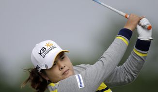 Inbee Park, of South Korea, hits a tee shot on the fourth hole during the first round of the ShopRite LPGA Classic golf tournament in Galloway Township, N.J., Friday, May 30, 2014. (AP Photo/Mel Evans)