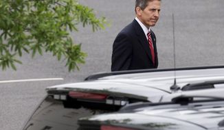 Deputy Veterans Affairs Secretary Sloan Gibson leaves the White House in Washington, Friday, May 30, 2014, after being named by President Barack Obama to run the Veterans Affairs Department on an interim basis while Obama searches for a replacement for Veterans Affairs Secretary Eric Shinseki who resigned Friday. (AP Photo/Jacquelyn Martin)