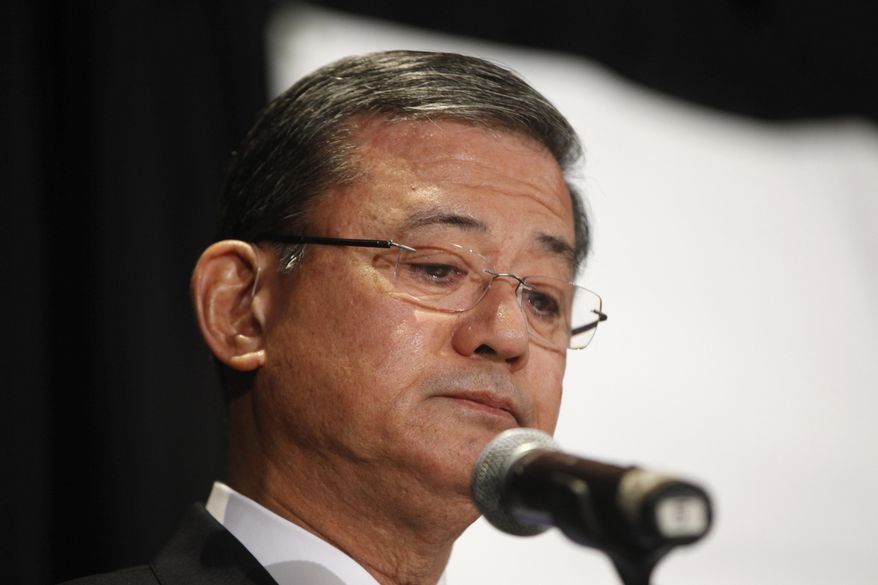 Veterans Affairs Secretary Eric Shinseki pauses as he speaks at a meeting of the National Coalition for Homeless Veterans, Friday, May 30, 2014, in Washington. President Barack Obama says he plans to have a "serious conversation" with Shinseki about whether he can stay in his job. (AP Photo/Charles Dharapak)