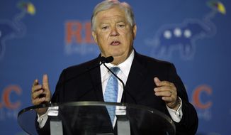 ** FILE ** Former Mississippi Governor Haley Barbour addresses the Republican Leadership Conference in New Orleans, La., Friday, May 30, 2014. (AP Photo/Bill Haber)