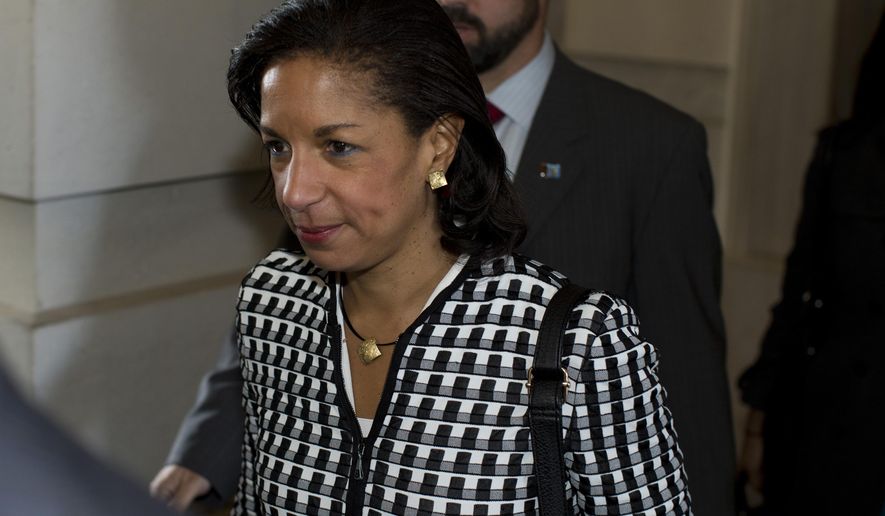 FILE - This Nov. 28, 2012 file photo show then-United Nations Ambassador Susan Rice leaving a meeting on Capitol Hill about the Benghazi terrorist attack. Once seemingly destined to become secretary of state, Rice now holds a lower profile job at the White House, juggling one global crises after another for President Barack Obama and trying to insure that his broad list of foreign policy priorities doesn’t fall by the wayside in the widening storm of problems overseas.  (AP Photo/ Evan Vucci, File)
