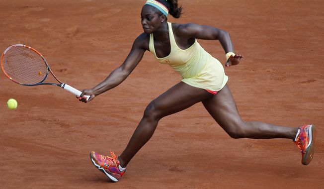 Sloane Stephens of the U.S. returns the ball during the third round match of the French Open tennis tournament against Russia&#x27;s Ekaterina Makarova at the Roland Garros stadium, in Paris, France, Saturday, May 31, 2014. Stephens won in two sets 6-3, 6-4. (AP Photo/David Vincent)